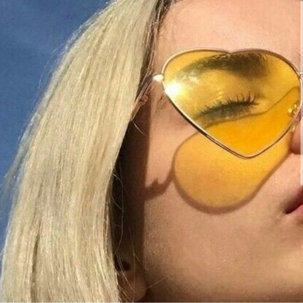 Yellow heart shaped sunglasses